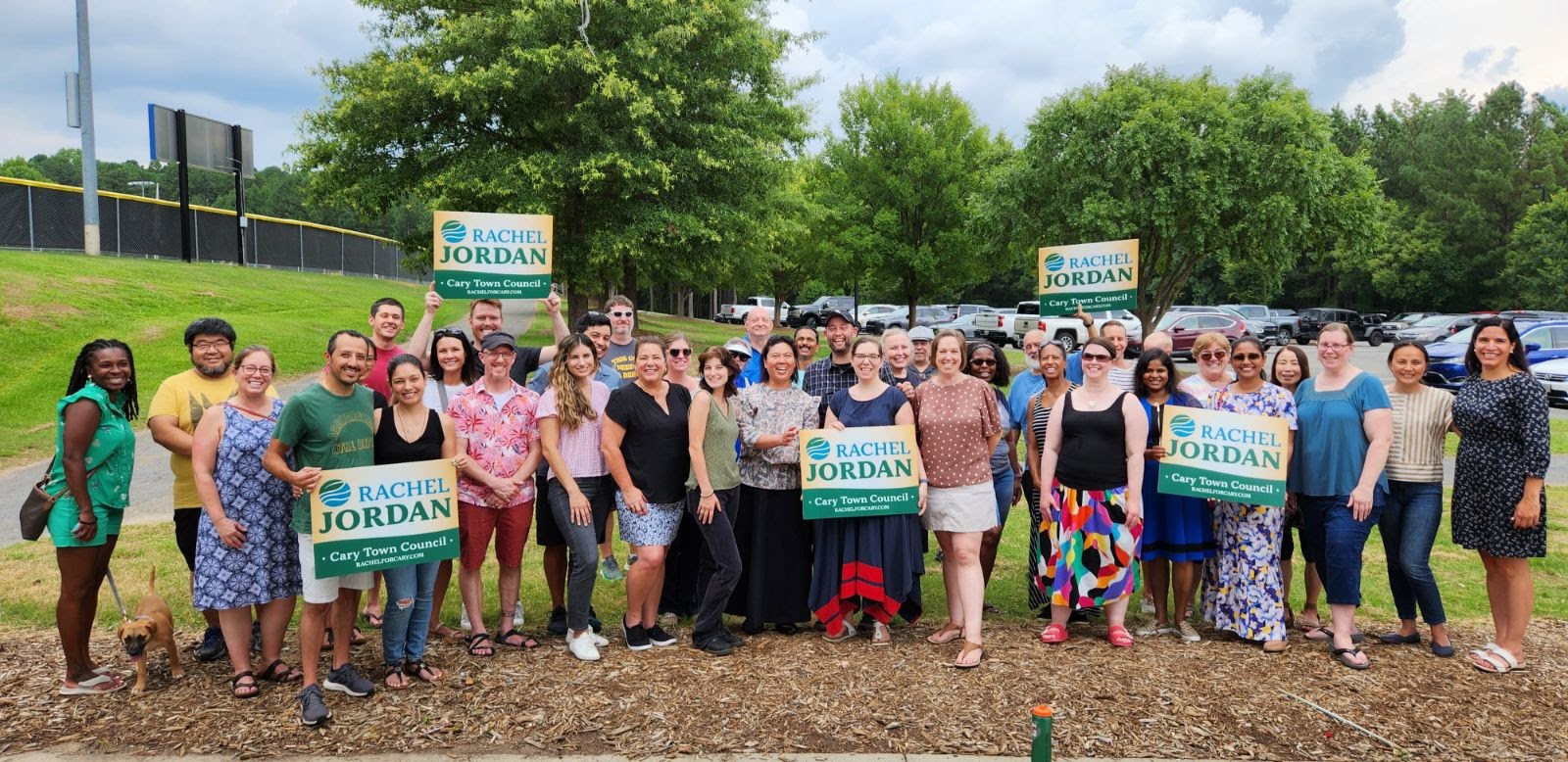Many people holding Rachel Jordan signs at Thomas Brooks Park